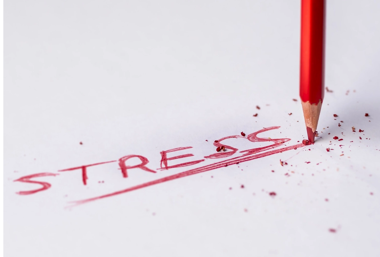 Stress written in red pencil